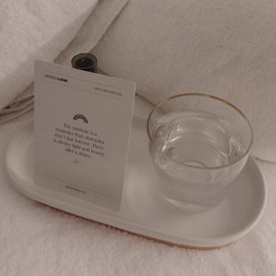 Massage affirmation card and glass of water
