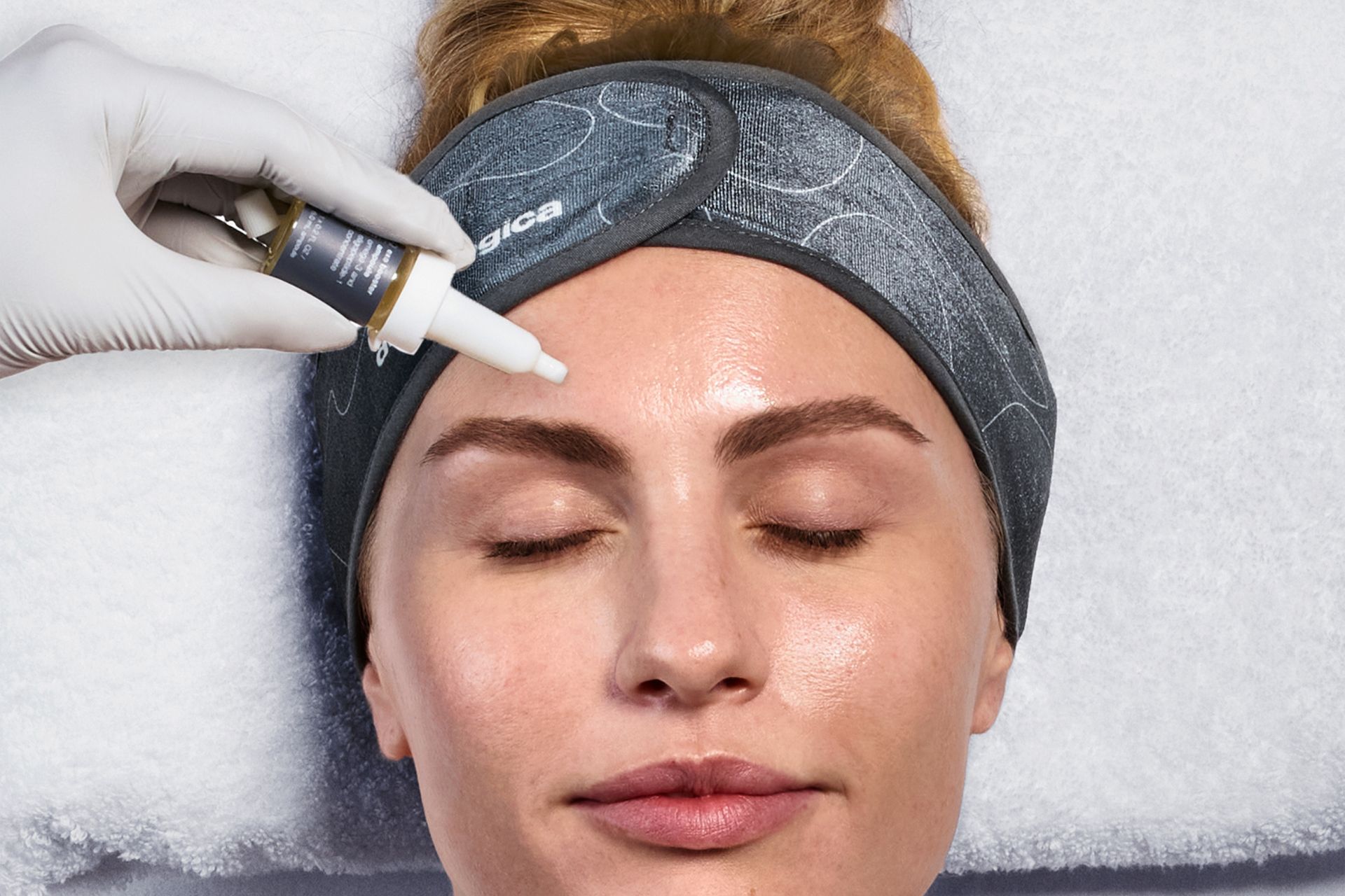 Woman with exosomes applied to face